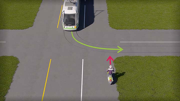 mallinnettu liikennetilanne; mopoilija lähestyy risteystä, johon on tulossa raitiovaunu