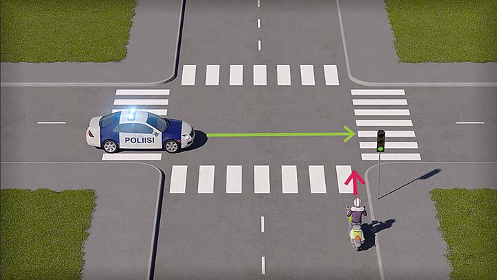 mallinnettu liikennetilanne; mopoilija lähestyy risteystä, johon on tulossa hälytysajoneuvo