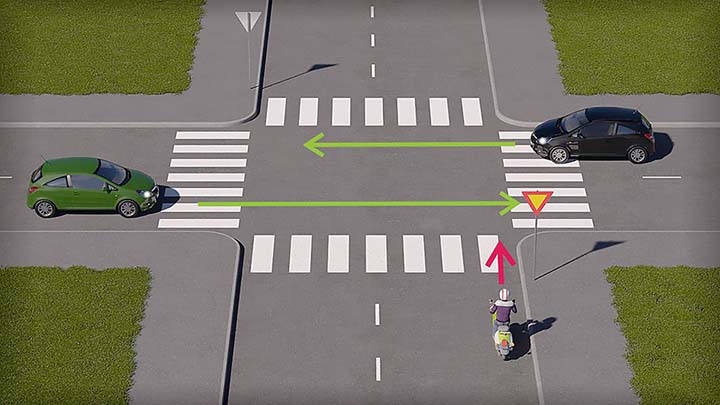 mallinnettu liikennetilanne, jossa mopoilija lähestyy risteystä kolmion takaa