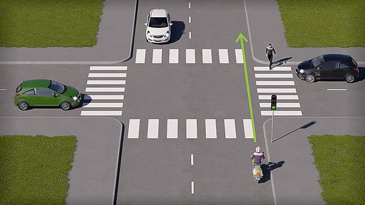 mallinnettu liikennetilanne, jossa mopoilija lähestyy valo-risteystä